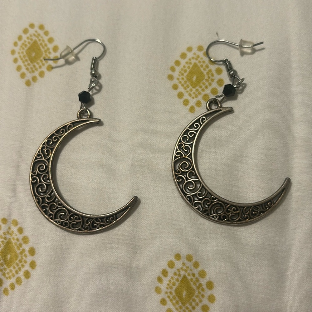 Silver tone moon earrings